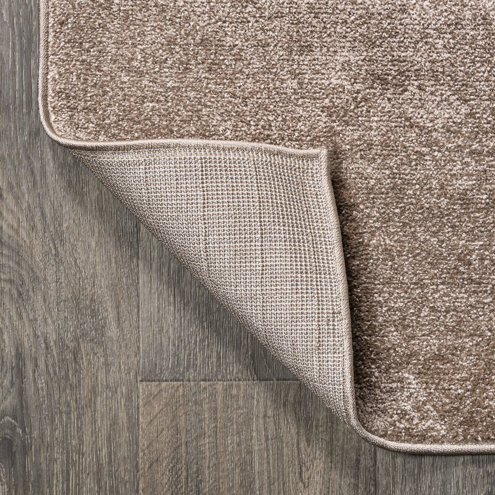 Haze Solid Low Pile Area Rug Brown
