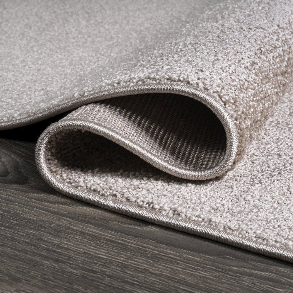 Haze Solid Low Pile Area Rug Beige