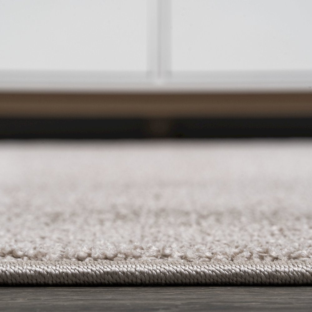 Haze Solid Low Pile Area Rug Beige