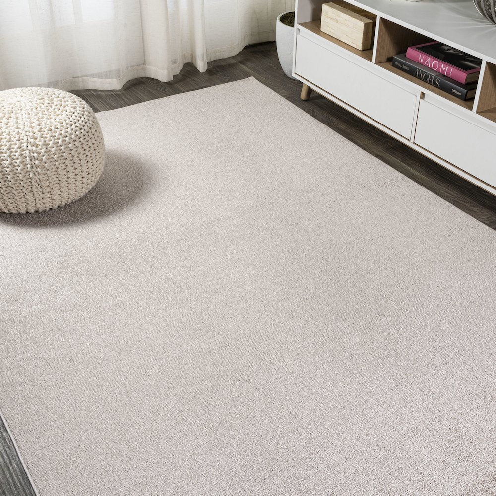 Haze Solid Low Pile Area Rug Beige
