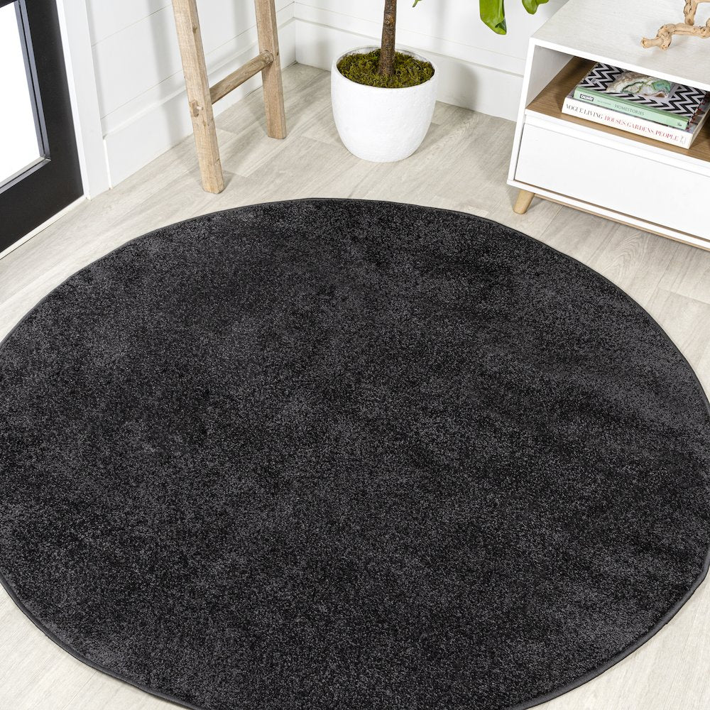 Haze Solid Low Pile Area Rug Black