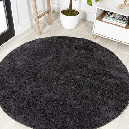 Haze Solid Low Pile Area Rug Black
