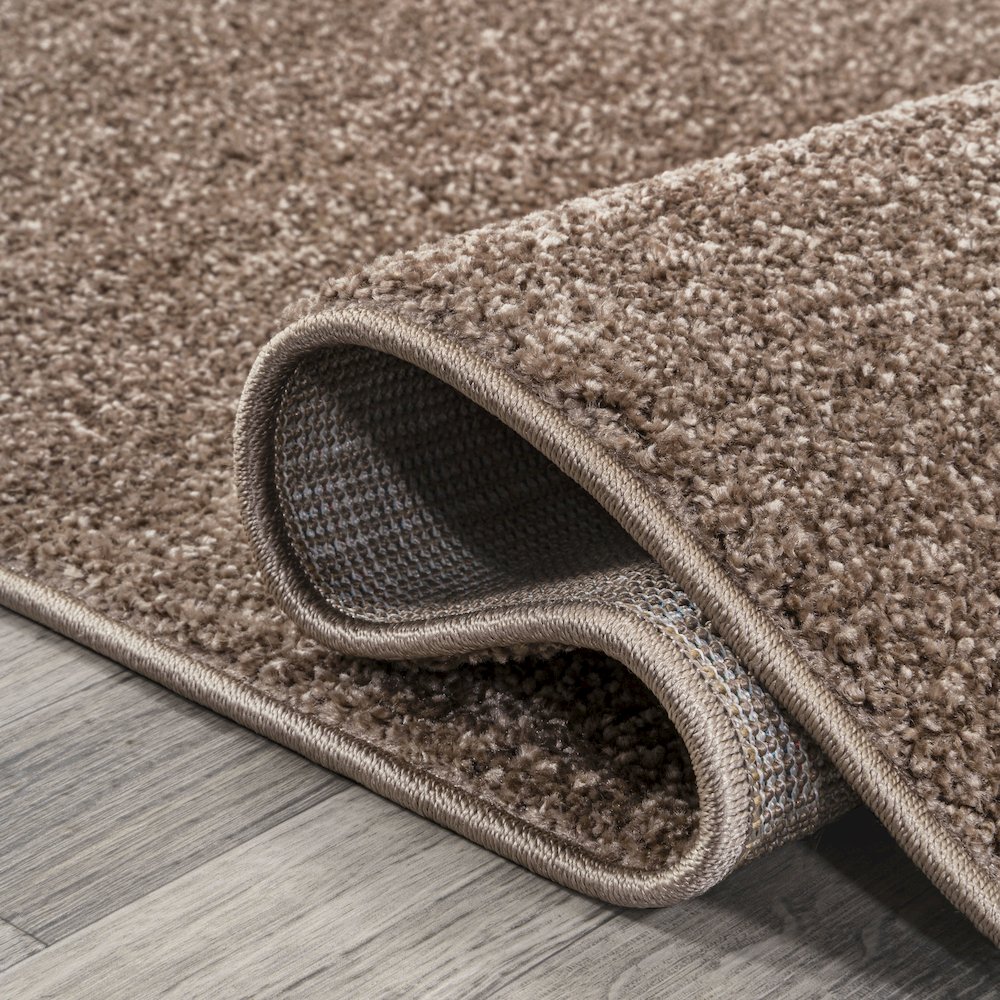 Haze Solid Low Pile Area Rug Brown