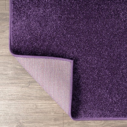 Haze Solid Low Pile Area Rug Purple