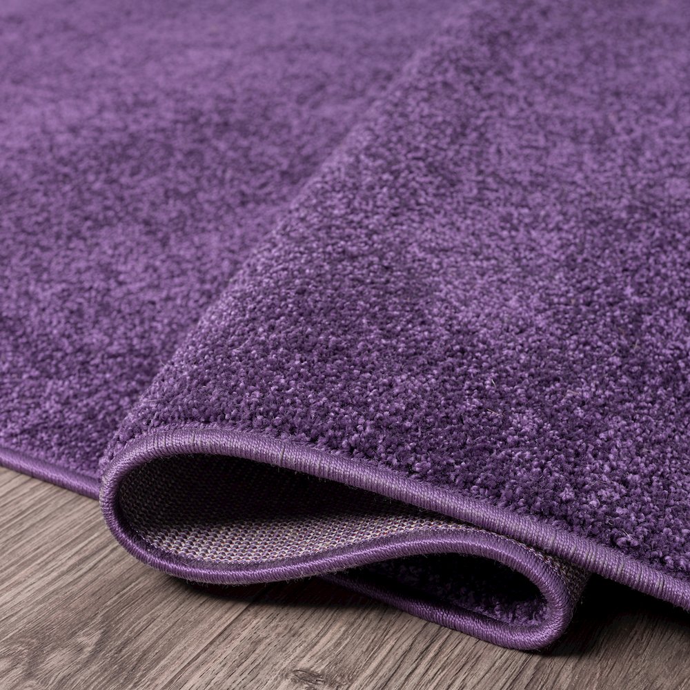 Haze Solid Low Pile Area Rug Purple