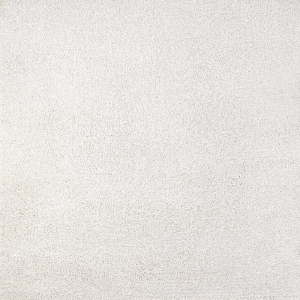 Haze Solid Low Pile Area Rug Cream