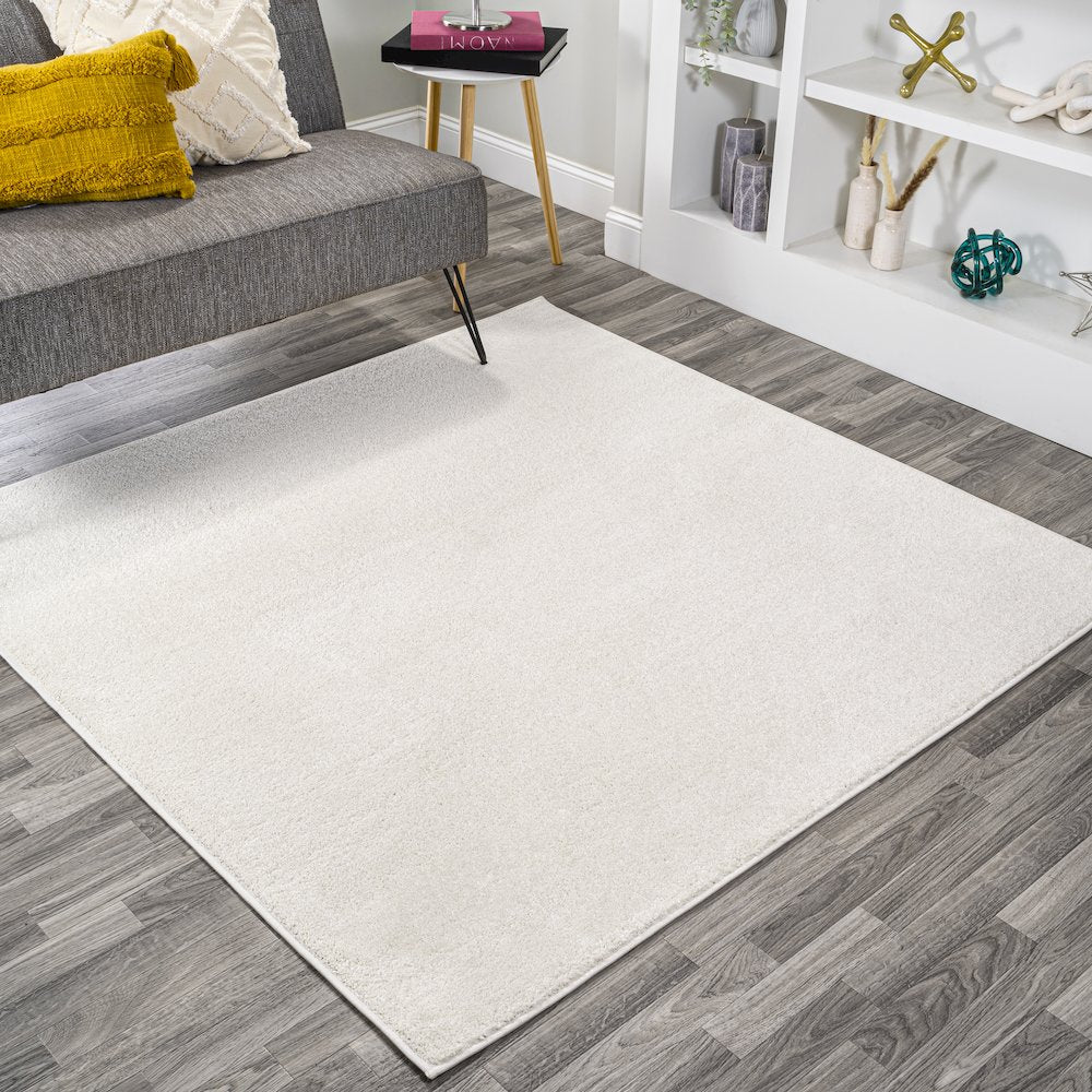 Haze Solid Low Pile Area Rug Cream