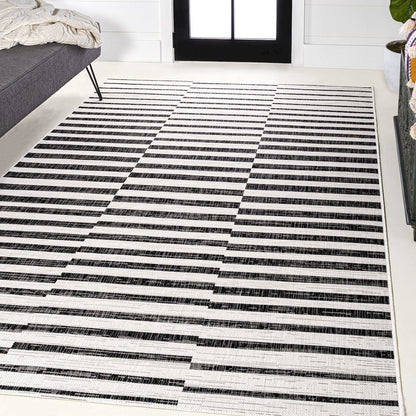 Sukie Modern Offset Stripe Indoor/Outdoor Area Rug