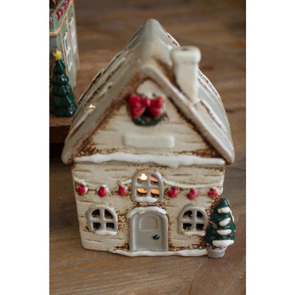 Set Of Four Ceramic Christmas Village