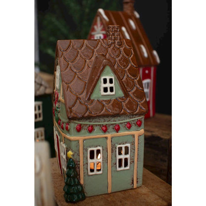 Set Of Four Ceramic Christmas Village