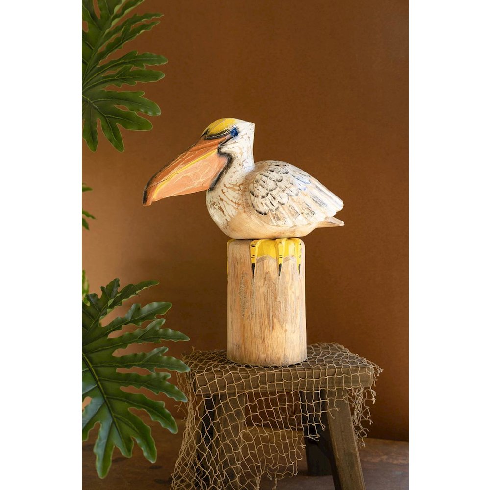 Carved Wooden Pelican On A Piling