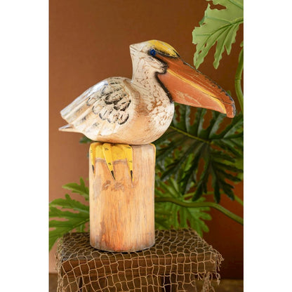 Carved Wooden Pelican On A Piling