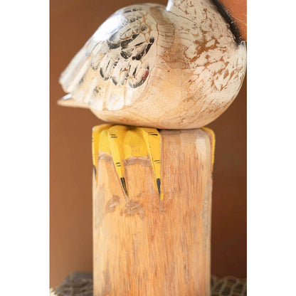 Carved Wooden Pelican On A Piling
