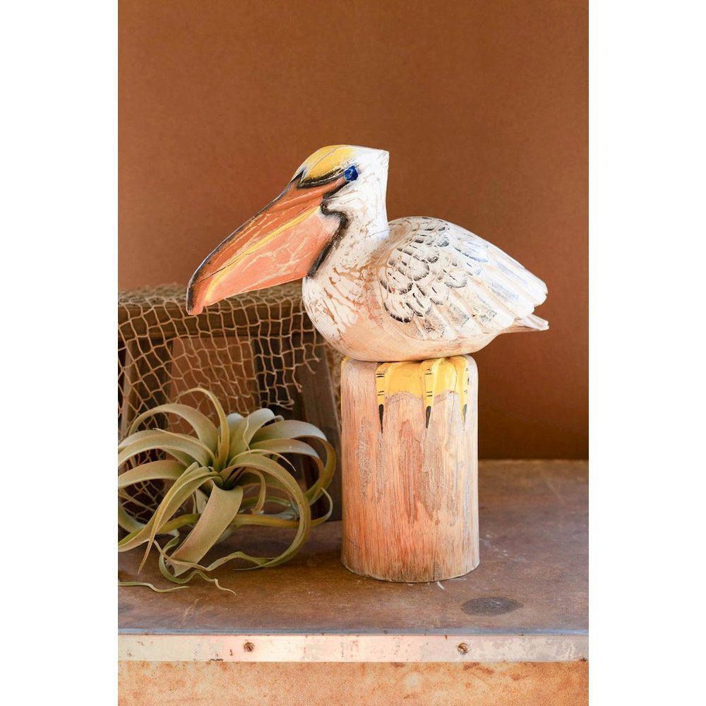 Carved Wooden Pelican On A Piling