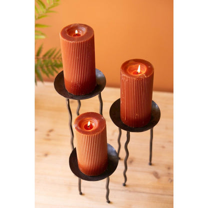 Set Of Three Rustic Metal Candle Stands With Wavy Legs