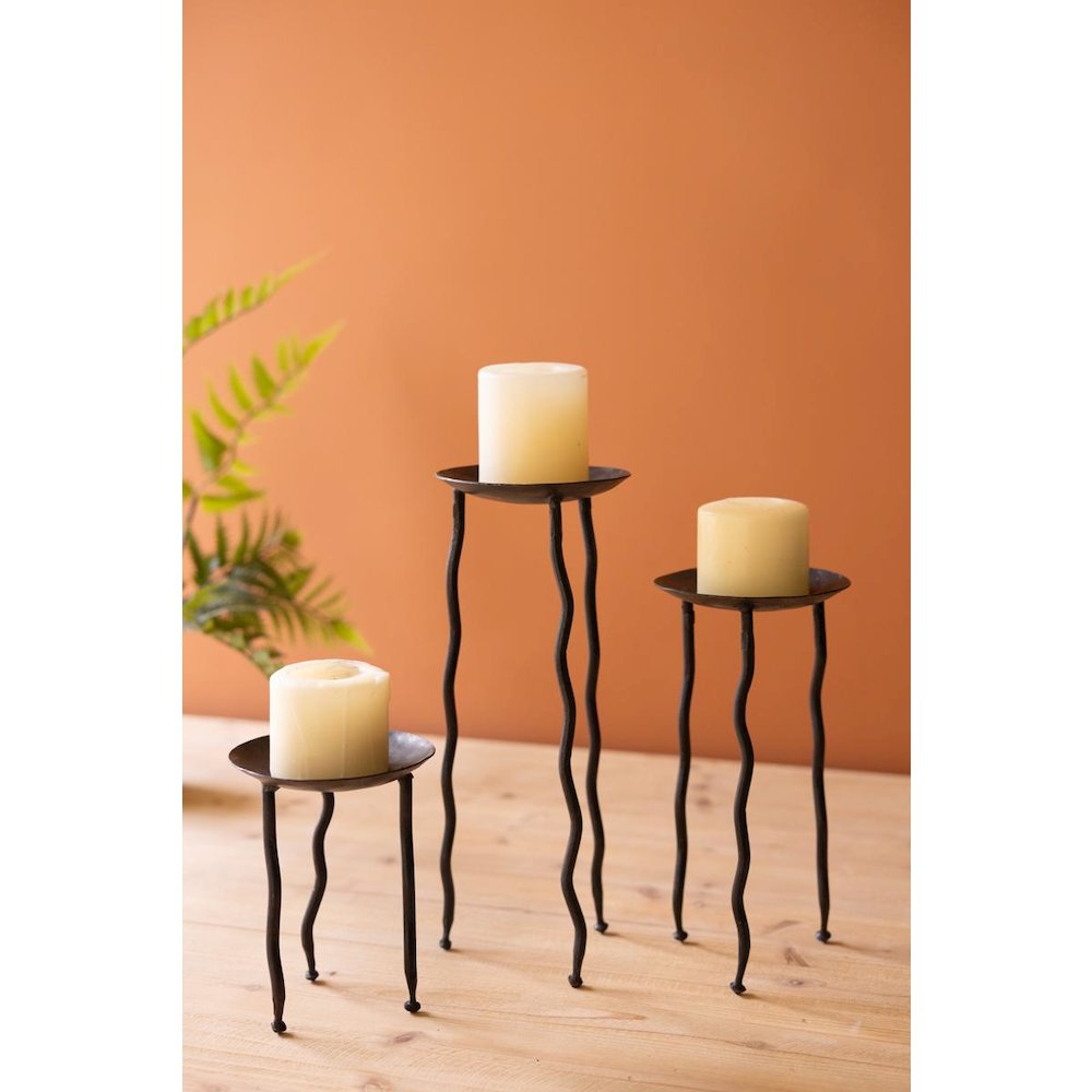 Set Of Three Rustic Metal Candle Stands With Wavy Legs