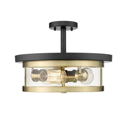 3-Light Black And Gold Flush Mount With A Clear Glass Shade