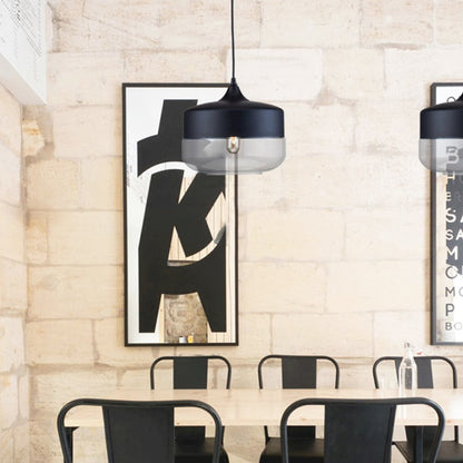 1-Light Matte Black Wall Sconce With A Clear Glass Shade