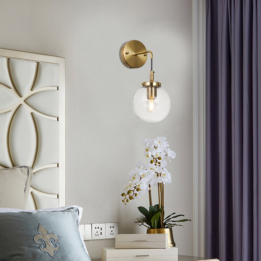 1-Light Brass Wall Sconce With A Clear Glass Globe Shade