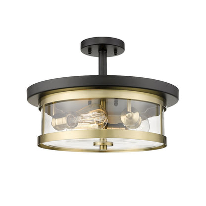 3-Light Black And Gold Flush Mount With A Clear Glass Shade