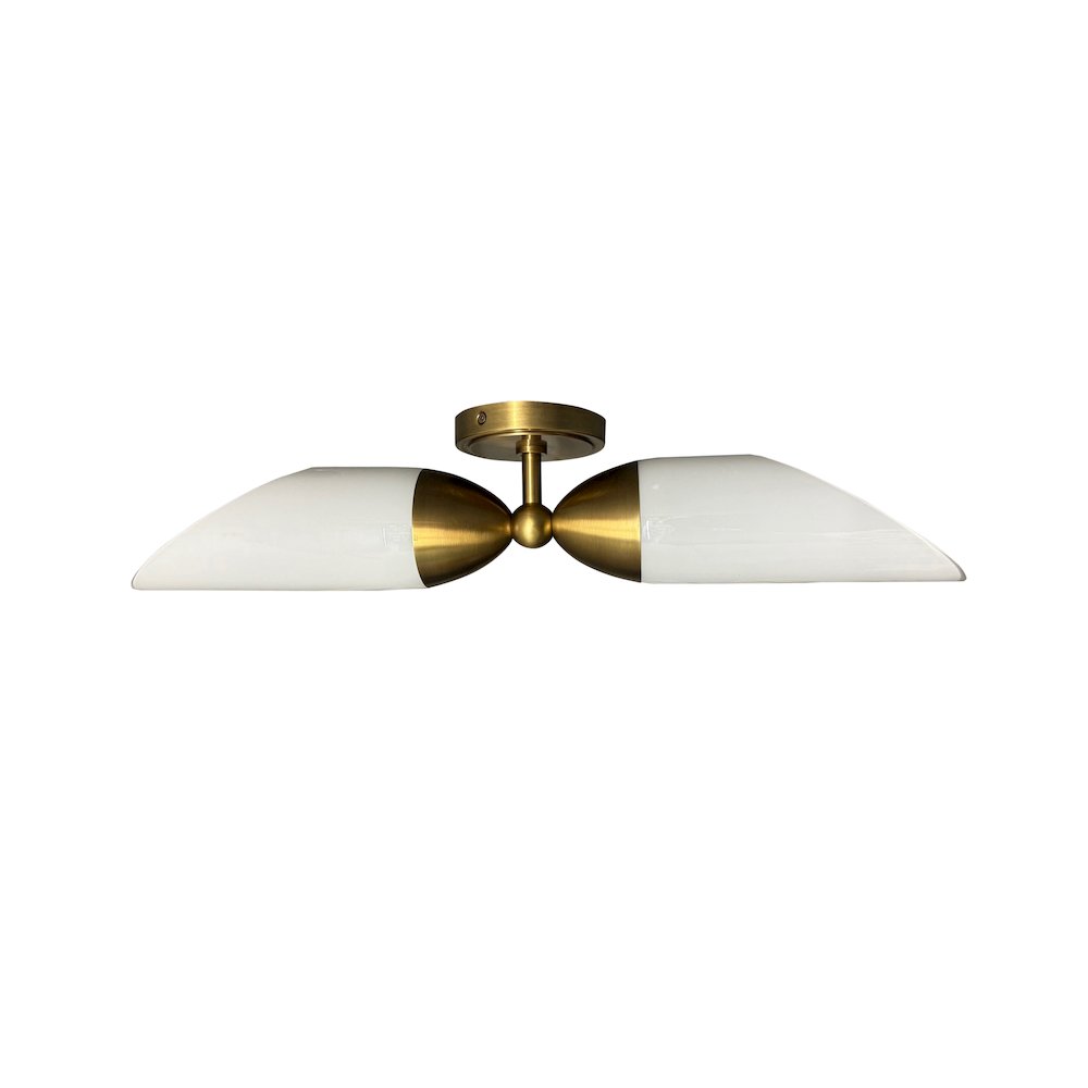 Double brushed brass sconce with slant cut white glass