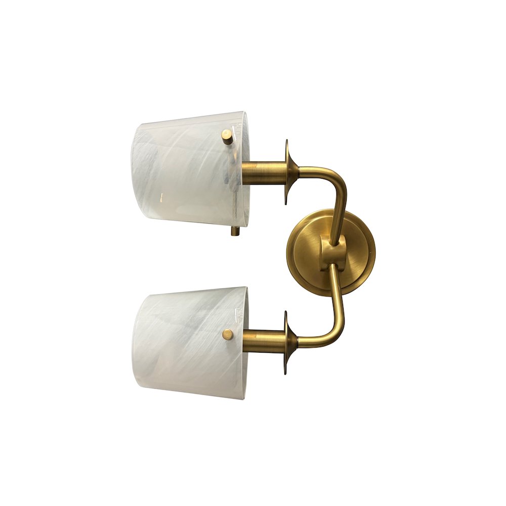 Double brushed brass sconce with curved arm and white swirl glass