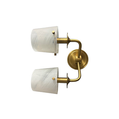 Double brushed brass sconce with curved arm and white swirl glass