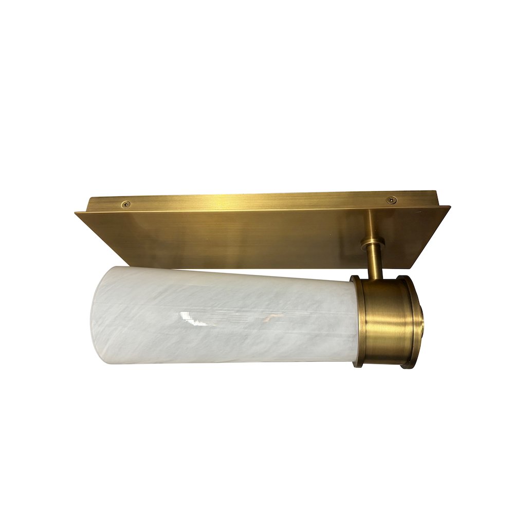 Single brushed brass sconce with rectangular backplate and glass shade