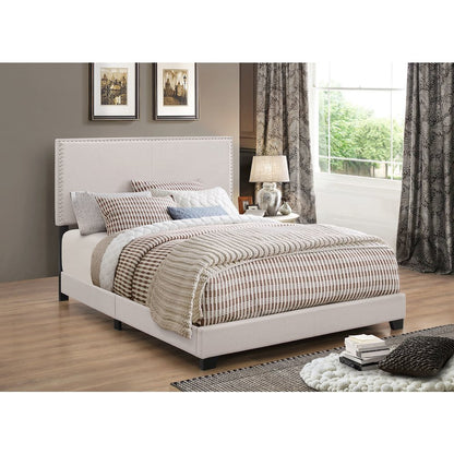 Upholstered Bed with Nailhead Trim