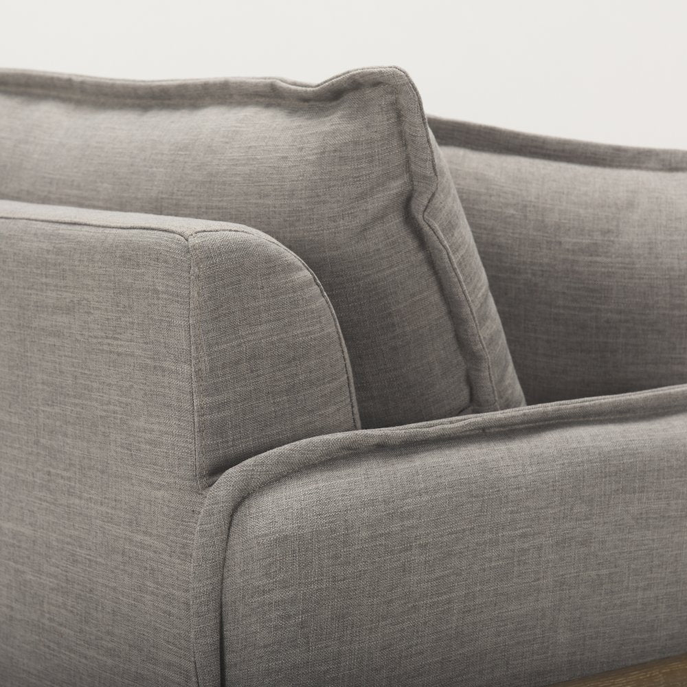 Roy Flint Gray Upholstered and Brown Wood Frame Arm Chair