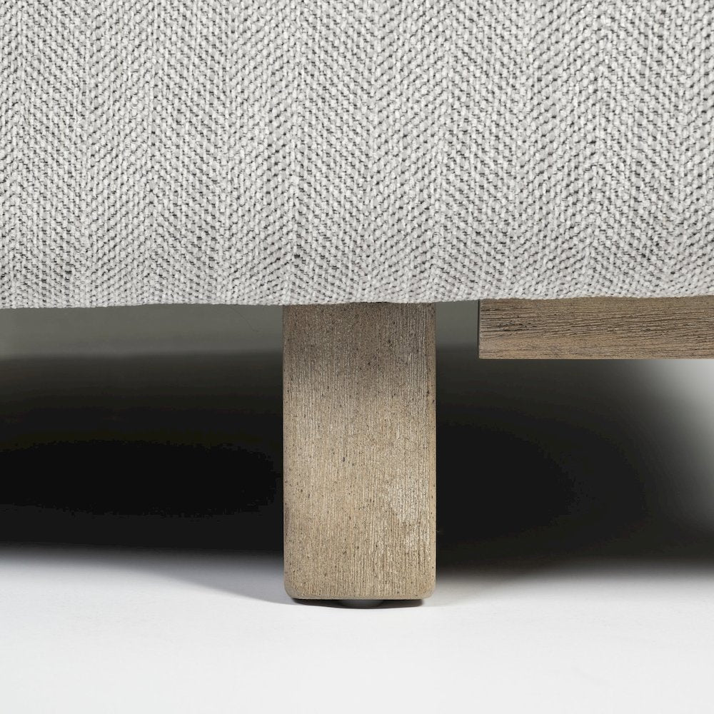 Roy Frost Gray Upholstered and Brown Wood Frame Arm Chair