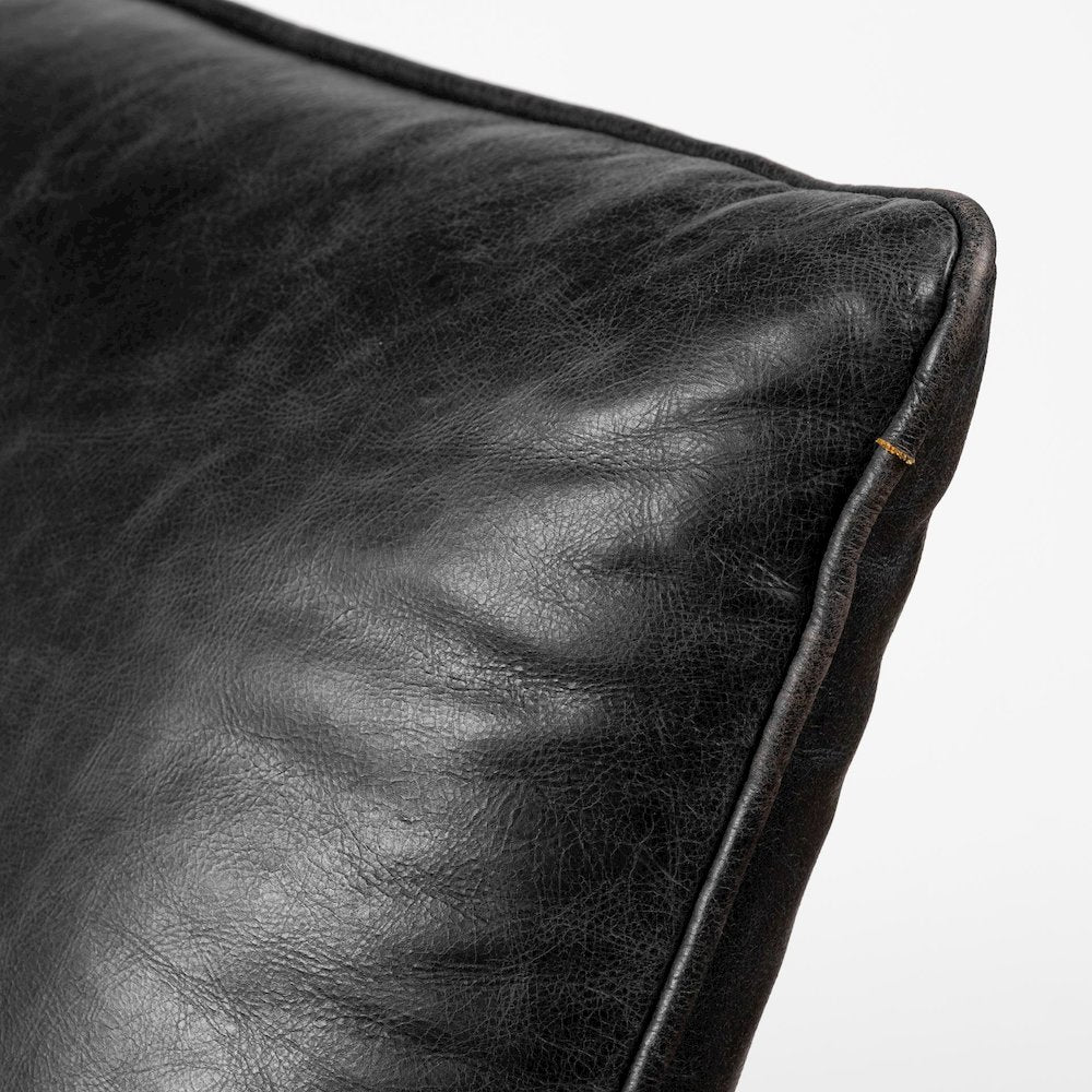 Flavelle II Black Leather Cushion Seat and Solid Iron Base Accent Chair