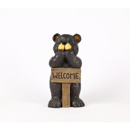 Bear Leans On Welcome Sign