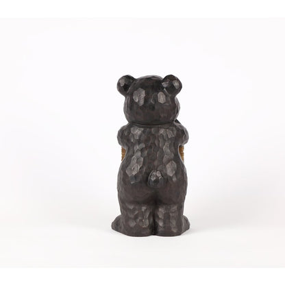 Bear Leans On Welcome Sign