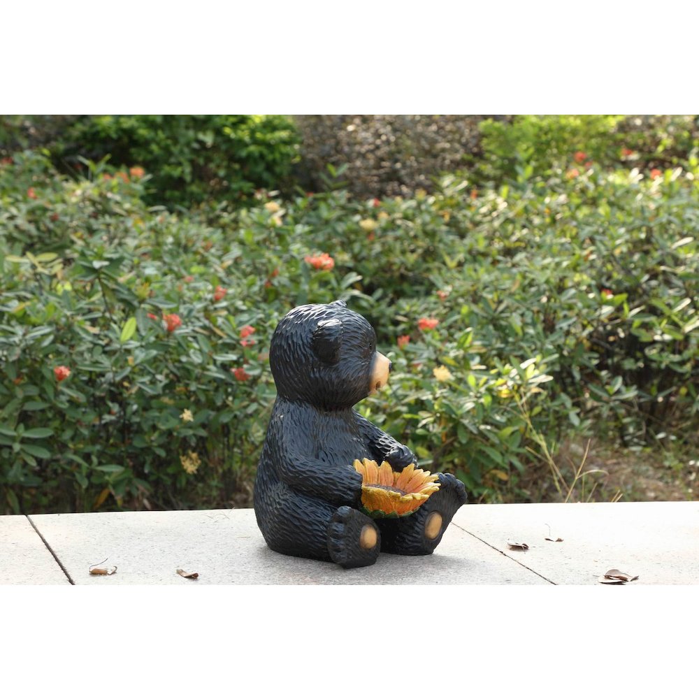 Bear Cub Holding Sunflower