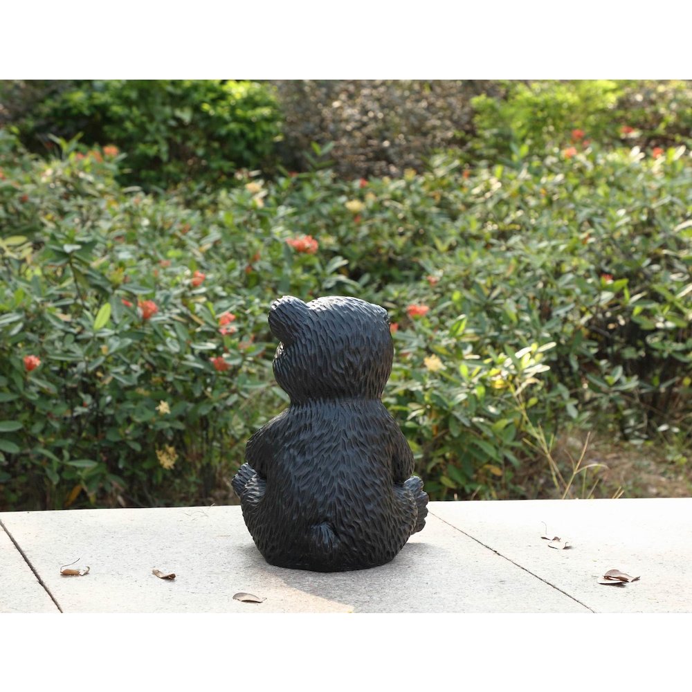 Bear Cub Holding Sunflower