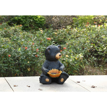 Bear Cub Holding Sunflower