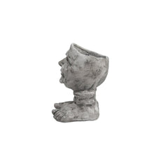 Joyful Grin: Whimsical Elegance in a Planter