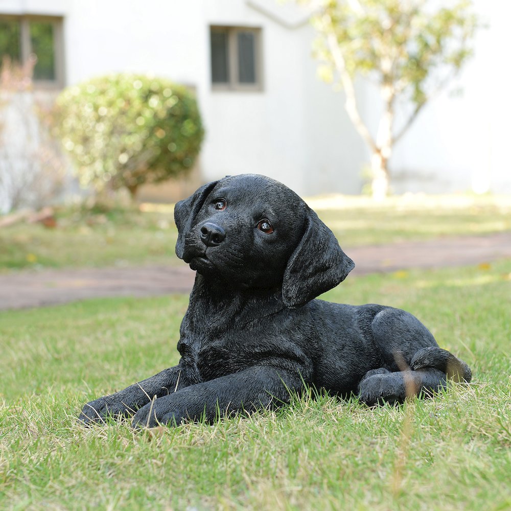 Midnight Reverie: Sleek Black Polyresin Lying Labrador Figurine