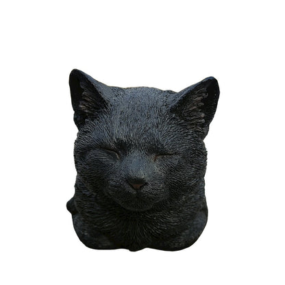 Serenity Snooze: Chic Black Polyresin Napping Cat Figurine