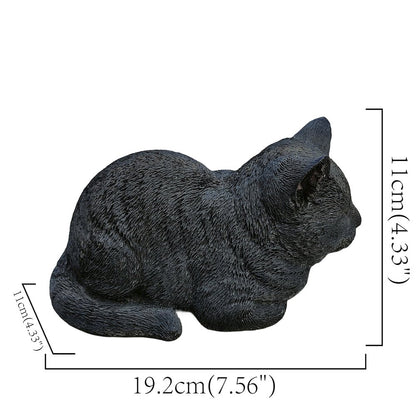 Serenity Snooze: Chic Black Polyresin Napping Cat Figurine