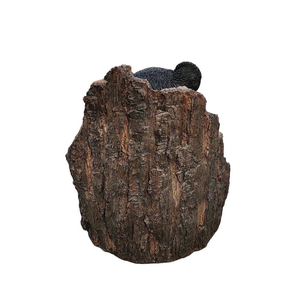 Lone Cub Haven: Intriguing Black Polyresin Bear in Stump Figurine