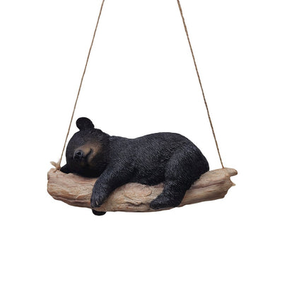 Suspended Cub Serenity: Striking Black Hanging Bear Polyresin Figurine