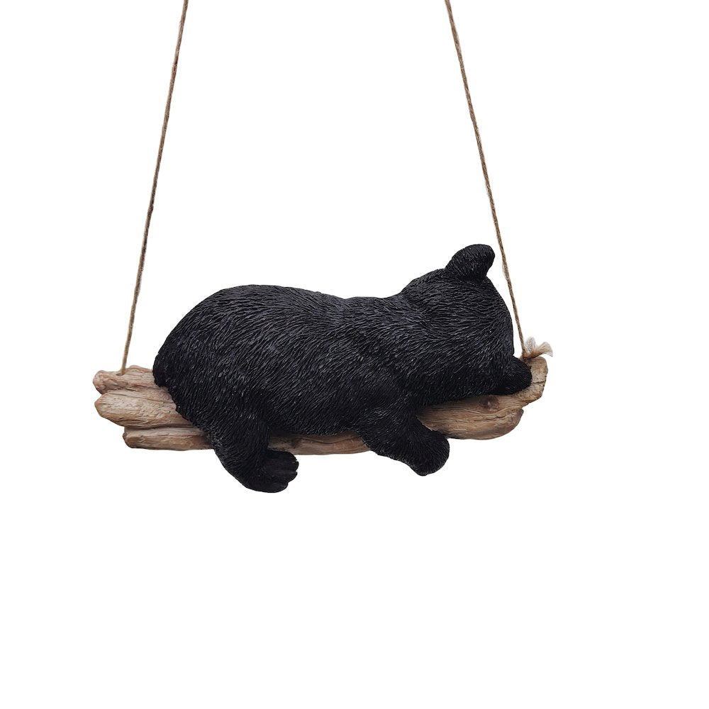 Suspended Cub Serenity: Striking Black Hanging Bear Polyresin Figurine