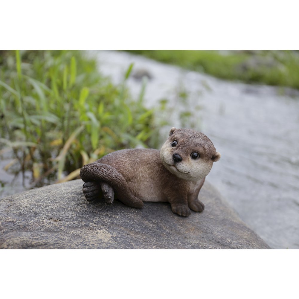 Otter Laying Back Statue