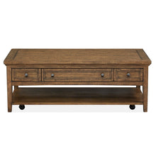 Bay Creek Toasted Nutmeg Rectangular Cocktail Table With Casters
